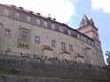 Zámek v Brandýse nad Labem pohledem od řeky zespoda.
